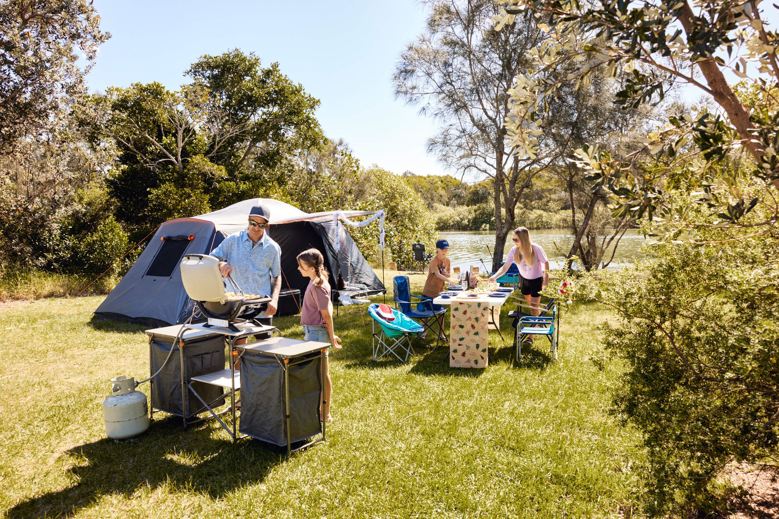 Camp cooking Happy family at camp